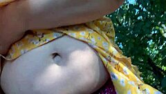 Pregnant milf wife milking own huge lactating boobs in a public outdoor