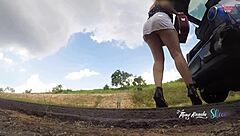 Look at this naughty girl in short skirt no panties opening car trunk on highway Thay Ksada