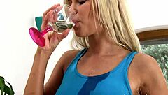 blonde beauty indulges in pee fetish drinking golden shower