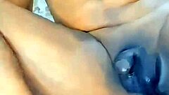 Detailed small cock ebony shemale strips and teases at home with dildo play.