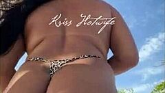 Married Prostitute Flaunts Tan Lines and Juicy Big Ass in Tiny Bikini on Beach