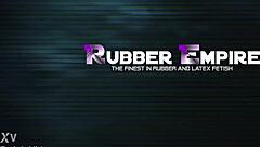 Holy shit, this bold beauty gets gangbanged in rubber latex by femdom slaves with strapons - part 3!