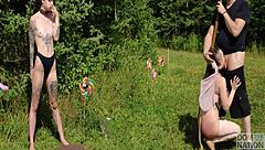 submissive ballerina dances outdoors for her doms in a kinky piss fantasy with rough face fucking and spanking