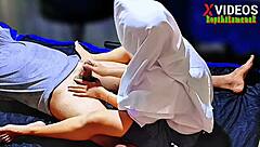 Indonesian amateur boldly satisfies landlord with intense fingering and handjob in homemade massage session