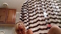 sassy brunette grabs massive dildo for intense solo fucking session. she pounds shaved pussy hard until explosive orgasm hits.