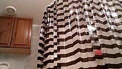 sassy brunette grabs massive dildo for intense solo fucking session. she pounds shaved pussy hard until explosive orgasm hits.