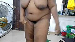 in a homemade video, a curvy woman showcases her dance moves with enthusiasm and flair