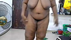 in a homemade video, a curvy woman showcases her dance moves with enthusiasm and flair