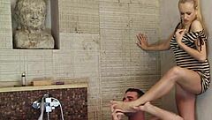 i enjoy a relaxing foot massage turning into close moment by the sink with this charming blonde