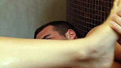 i enjoy a relaxing foot massage turning into close moment by the sink with this charming blonde