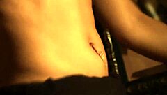 what makes this brunette so captivating in her sleek black dress?