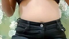 Beautiful Indian girl enjoying fingering in her bedroom.