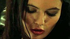 Submissive teen in silk panties faces femdom whipping on bare ass from lesbian mistress in bondage.