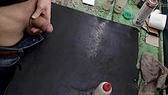 Skinny young amateur strokes huge cock solo on workbench at work