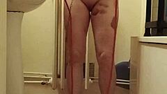 Amateur milf bound in BDSM humiliation session flashing natural tits as submissive slave in 2024.