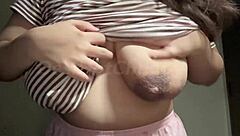 Hot Indian milf teases her big natural tits and lactating nipples on webcam in solo masturbation close-up