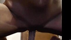 Blonde woman uses dildo for anal masturbation