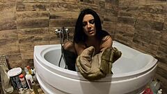 I feel so aroused peeing in the bathtub while wearing my fur coat and pantyhose for this milf preview