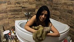 I feel so aroused peeing in the bathtub while wearing my fur coat and pantyhose for this milf preview