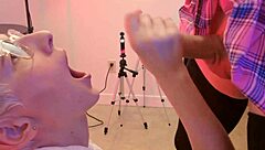 In a homemade session, a cute short-haired European blonde receives a golden shower on her face