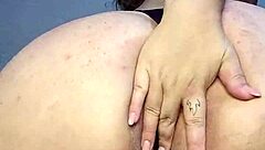 in a homemade amateur video, the curvy latina bbw chubby woman rides her 9-inch dildo deep