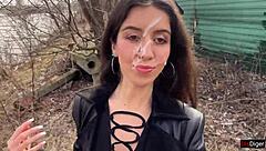 in a daring public fetish act, a girl gets cum on her face to walk through the park shocking people