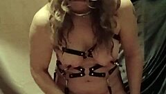 Bondage milf in leather harness and mouth spreader for solo bdsm masturbation