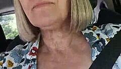 Hey, check out my naughty housewife flashing her tits in this homemade car selfie!