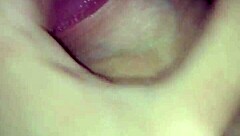 In a quiet room, a man reveals his enormous veiny penis, thick and gigantic, pulsing with intensity as he strokes it slowly for the camera.