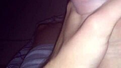 In a quiet room, a man reveals his enormous veiny penis, thick and gigantic, pulsing with intensity as he strokes it slowly for the camera.