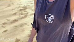 wife enjoys a relaxing walk around the public beach without clothes