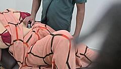 Indian Doctor Examining Lady Patient In Clinic