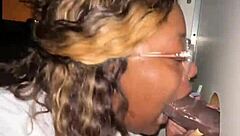 hey check this ebony bbw sucking strangers big black cock at gloryhole