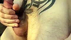 i love stroking my hairy tattooed body while jerking off outdoors in the forest