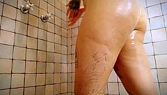 Giantess Shows Off Shaving Her Shaved Pussy In Shower With Careful Water Play