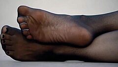 Exciting feet display in sleek nylon pantyhose!