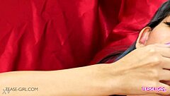 Sexy brunette teen with perfect body poses seductively on sofa during casting