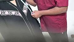 doctor performs routine check on hijab lady in hospital