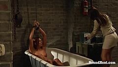 in a casual scene the tied up lesbian slave gets dominated and humiliated by her merciless madame