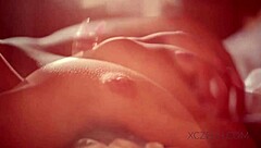 oh wow this young asian babe is fingering her huge tits and masturbating wildly