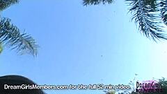 katie uses a dildo on her best friend's shaved pussy outdoors until she reaches orgasm