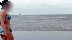 skinny japanese college girl's infinity pool tease