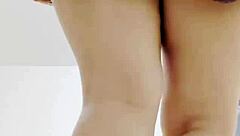 blonde in miniskirt shakes big natural tits ass