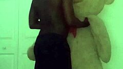 stretching like scorpio spider or cancer crab with toy bear during workout