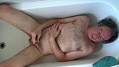 guy strips naked and wanks hard to cumshot