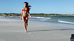 Gorgeous brunette gloria sol strips horny on beach