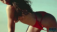 Gorgeous brunette gloria sol strips horny on beach