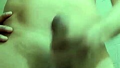 Skinny guy strokes huge cock in work bathroom solo