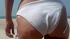 fat ass pees white bikini on crowded public beach!