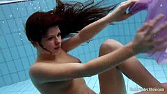 Aneta’s Big Tits Tease in Purple Poolside Dress